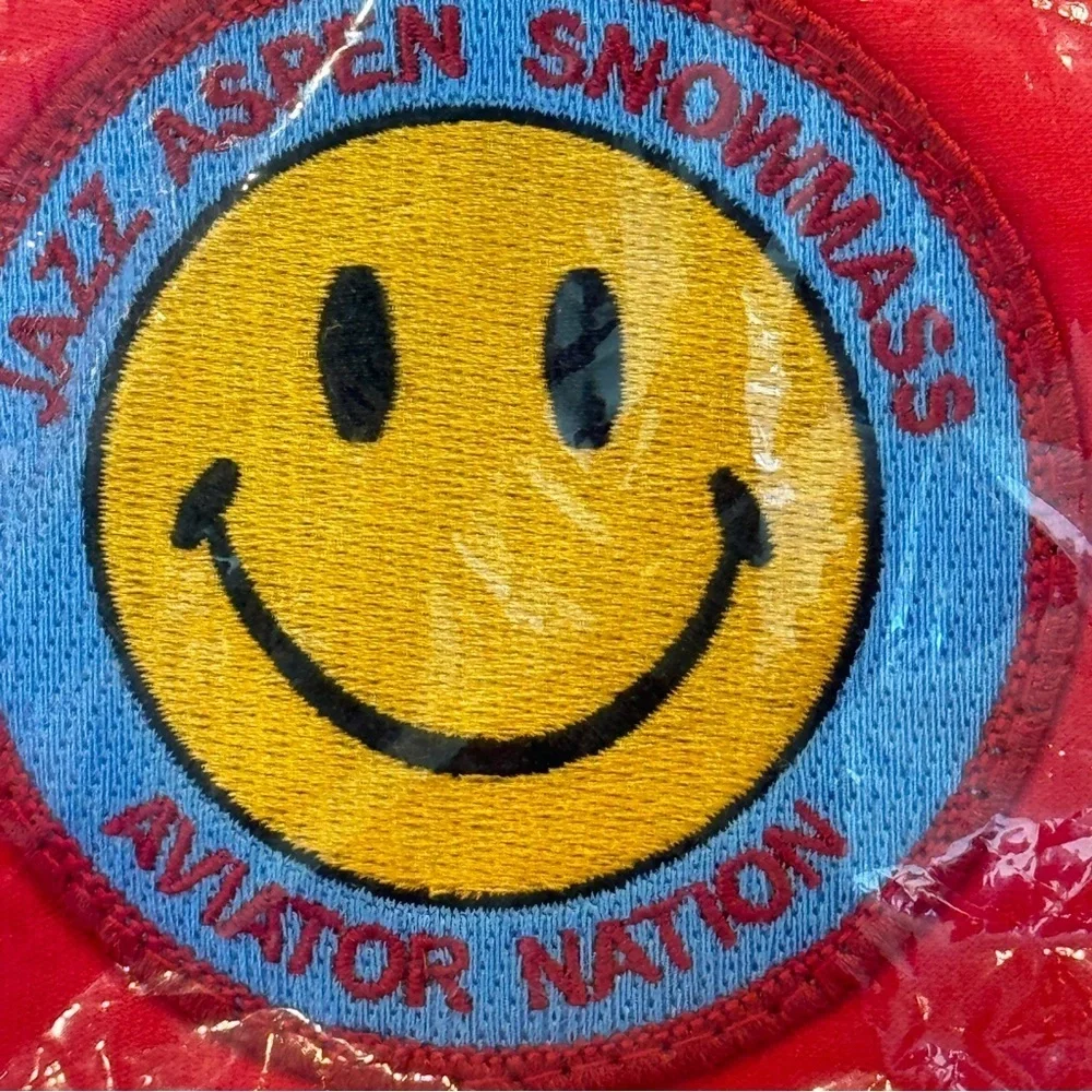 NWT Aviator Nation Jazz Aspen Snowmass 2022 Festival Trucker Hat Smiley Red​